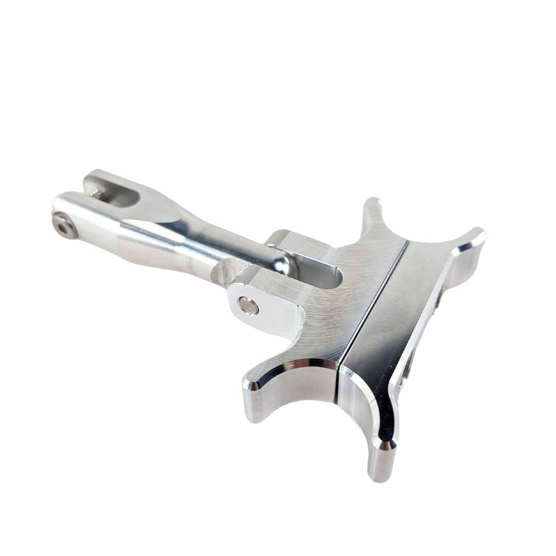 Stainless steel multi-tool with a TC Bros. Pro Series Gauge Relocation Bracket for 1-1/4 Risers and T-Bars on a white background.