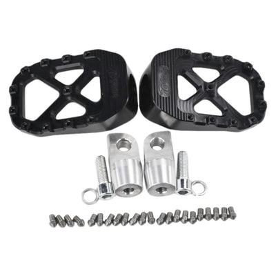A pair of TC Bros. Pro Series Black MX Foot Pegs and bolts provide high traction and stability for a Harley Davidson rider on a white background.