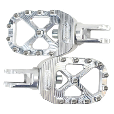 A pair of TC Bros. Pro Series MX Rider Foot Pegs for 2018-newer Harley Softail & Pan America on a white background.