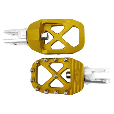 A pair of TC Bros. Pro Series Gold MX Rider Foot Pegs on a white background.