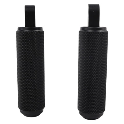 A pair of black rubber TC Bros. Nomad Foot pegs for Harley Models - Knurled - Black with a knurled surface on a white background.