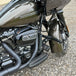 The TC Bros. Front Crash Bar mounting kit for 2014-2023 Harley-Davidson Touring includes bolts and spacers, shown above a motorcycle image—ideal for front engine guard or crash bar installation.