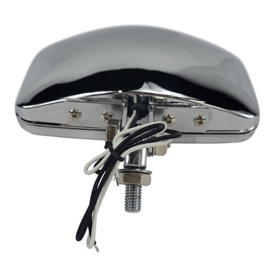 A Moto Iron® Rectangle Chopper Headlight - Chrome - Amber Lens with an amber glass lens.