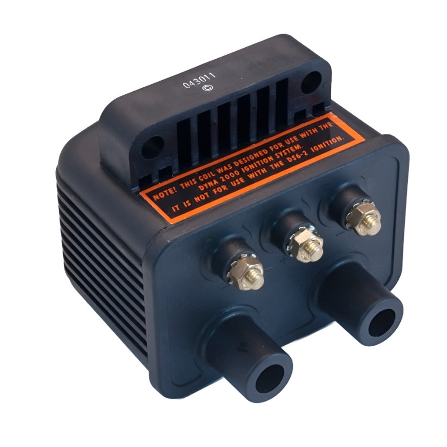 An ignition coil for an internal combustion engine, with a label warning it is not for use with solid-state ignition systems. Designed specifically for Big Twin Sportster FXD Models, the Dynatek Twin Fire II Miniature 3 Ohm Coil is a perfect fit.