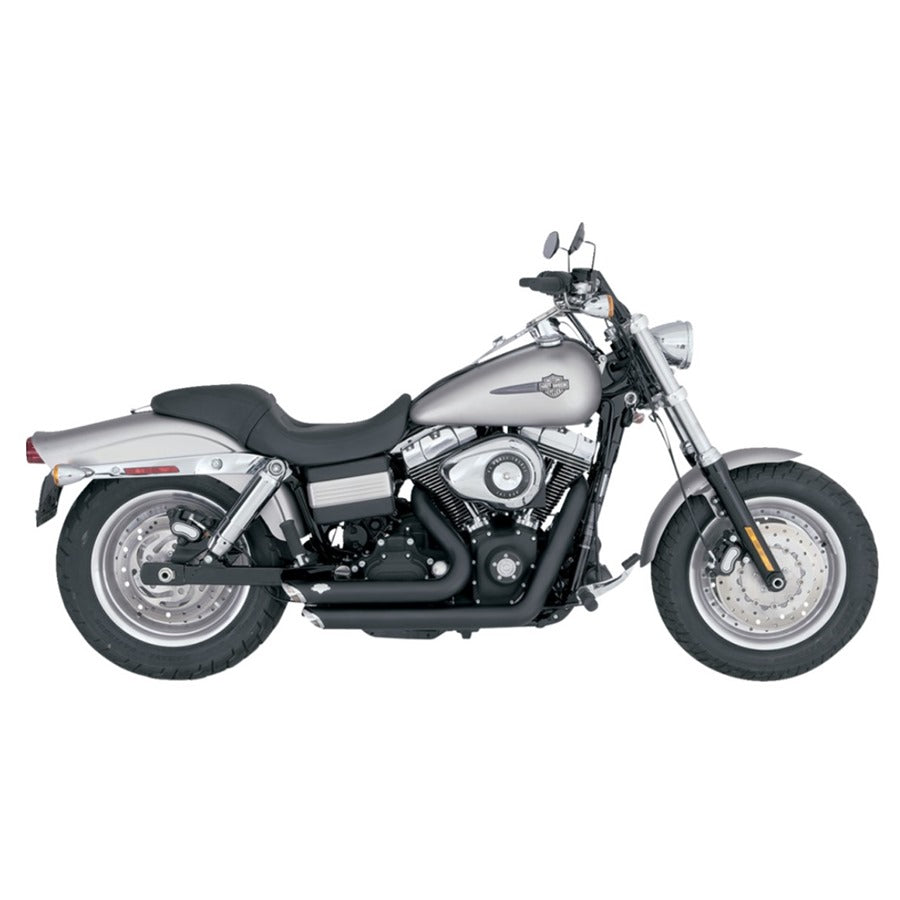 A silver motorcycle with a Vance & Hines Short Shots Exhaust System 06-09 Fat bob, Dyna, Low, Wide & Super Glide - Black on a white background.