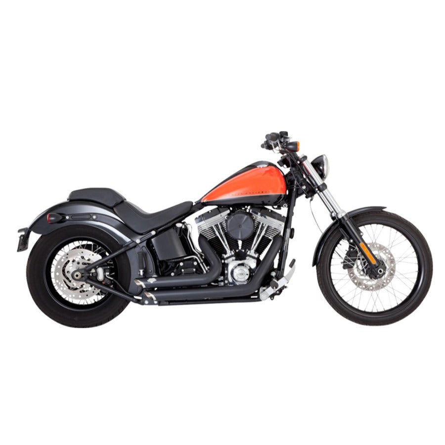 A black and orange motorcycle with a Vance & Hines Shortshots Staggered Exhaust System on a white background.