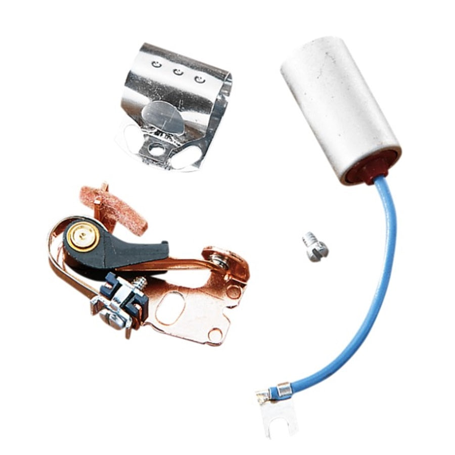 Disassembled components of a small motor, including oversized ventilated points and condenser from Blue Streak, on a white background.