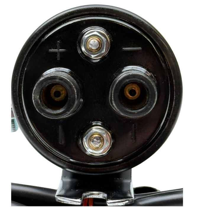 The Moto Iron® Big Twin High Performance Round Coil with Wires (fits 65-79) in black, featuring a metal bracket and red tie-bound connector cables, ensures optimal efficiency.