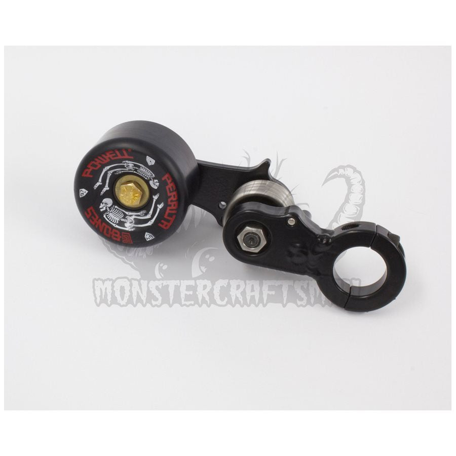 A handlebar lever for a Monster Craftsman monstercraft motorcycle that features a black 1" Clamp On Chain Tensioner - Skate Wheel (Powell Peralta) for the drive chain.