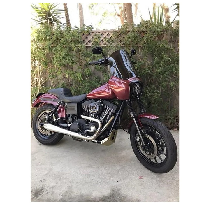 A close up of a motorcycle engine with an Invisivin Magnetic Vin Sticker Cover from the 1999-2005 Dyna Stepped frame.