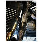 A close up of a motorcycle engine with an Invisivin Magnetic Vin Sticker Cover from the 1999-2005 Dyna Stepped frame.