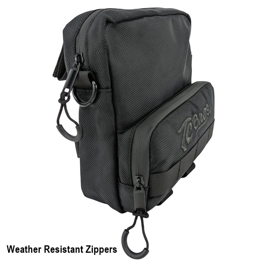 A black TC Bros. Motorcycle Handlebar Bag with weather resistant zippers on it.