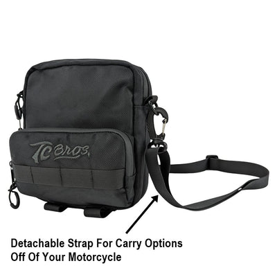 A TC Bros. Motorcycle Handlebar Bag with a strap attached to it.