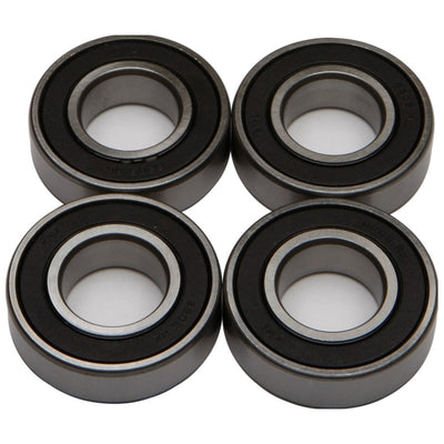 Four black All Balls 25mm Rear Wheel Bearing Kit For Harley Touring Non-ABS 2009-2022 on a white background.
