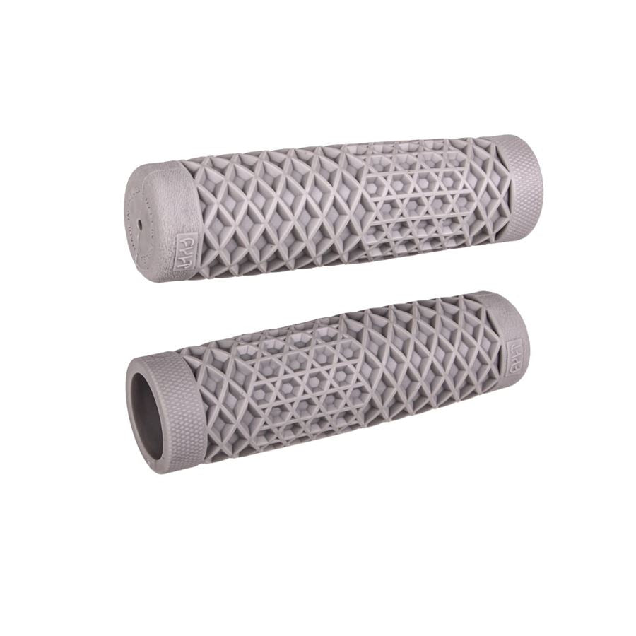 A pair of gray rubber ODI Cult Motorcycle Grips on a white background.