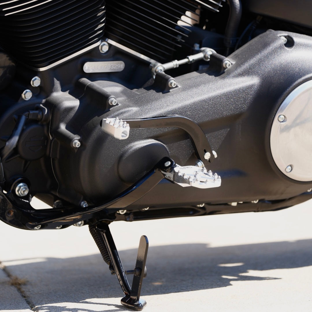 A motorcycle with a black engine, perfect for TC Bros. riders seeking high performance and traction.