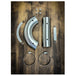A set of SP Concepts Stainless Heat Shields for All M8 Softails & Baggers, 99-05 Dyna, 06-17 Dyna motorcycle exhaust fittings on a wooden table.