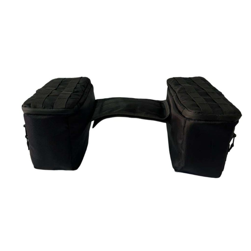 Introducing the Speedwell Cutaway Saddlebags for Harley Sportsters, M8 Softail, and Dyna—an elegant black saddlebag featuring dual compartments with stitched detailing and handles on each side. Expertly designed to straddle over the back of a motorcycle seat, it&