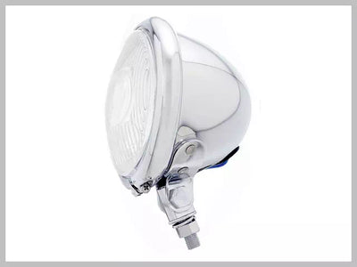 A 4.5" Vintage Bates Style Headlight - Chrome by Drag Specialties on a white background.