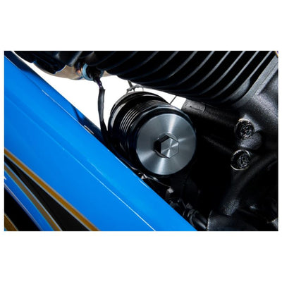 A close up of a blue PC Racing Harley motorcycle engine with a PC Racing Reusable Oil Filter For Harley 1980-2023 - Black.
