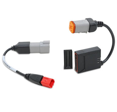 A black and red Dynojet Power Vision 4 For Harley 2021-2023 car adapter with a red plug.