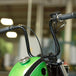 Two Moto Iron® Screw-in Fuel Caps for Harley-Davidson and Custom, one matte and one chrome, each with ribbed silicone inserts, are displayed against a white background.