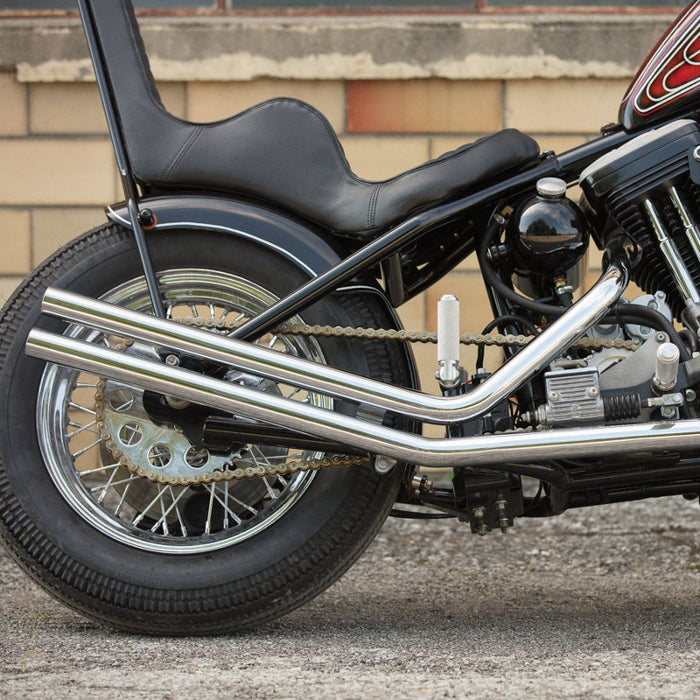 TC Bros. Weld-On Hardtail Kit for 1982-2003 Harley-Davidson Sportster with stock width tire, by TC Bros., includes a steel frame with seat tube and chain stays plus hardware components, all neatly arranged on a white background.