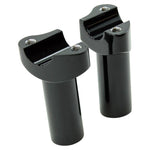 Two Moto Iron® 3.5" Black Forged Handlebar Risers for Harley, featuring a sleek black finish and mounting holes, stand upright on a white background.
