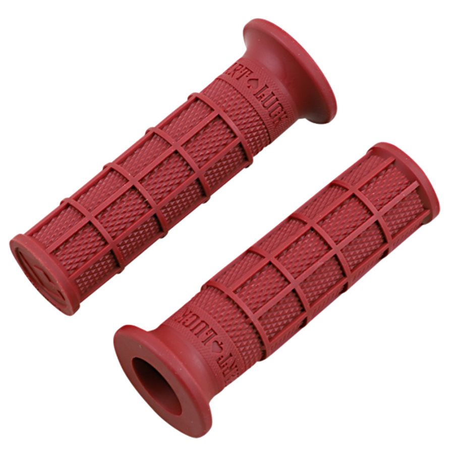 A pair of ODI Hart-Luck Signature Full-Waffle Slip-On 1" Grips - Red, on a white background.