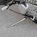 A close up of TC Bros Universal Linkage Kit metric forward control handlebars.