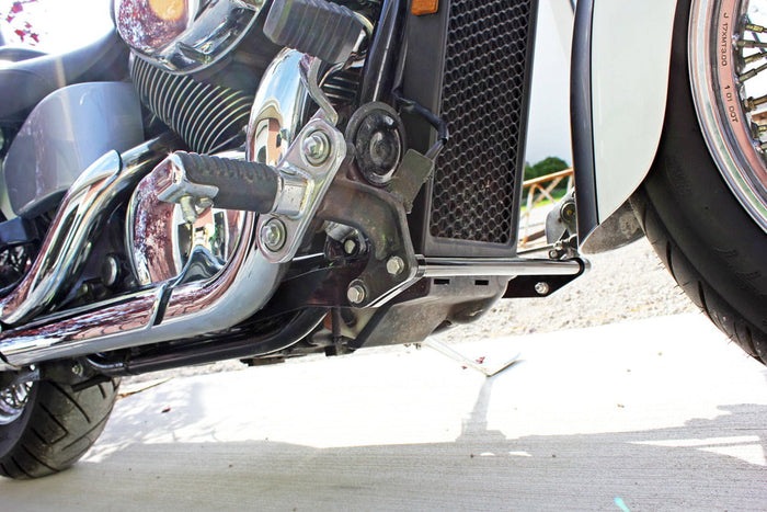 A close up of the front of a TC Bros. Honda Shadow ACE 750 Forward Controls Extension Kit 1998-2003 VT750 motorcycle, featuring forward controls extension kit for enhanced riding experience. The motorcycle is proudly manufactured in the USA.