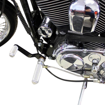 A close up image of a TC Bros. Sportster Forward Controls Kit for 91-03 5 Speed motorcycle engine.