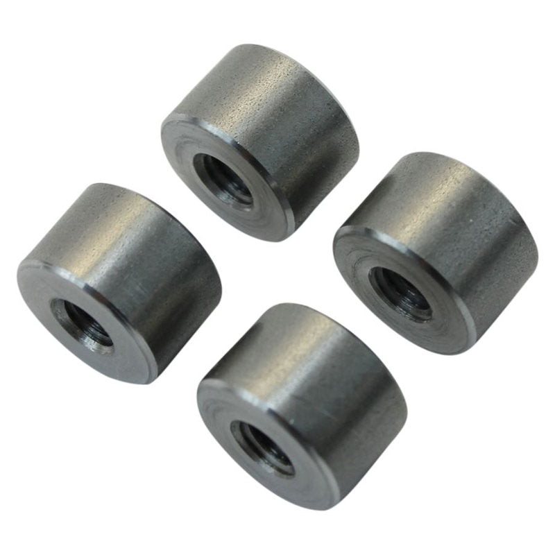 Four TC Bros stainless steel nuts on a white background, perfect for bike mounting.