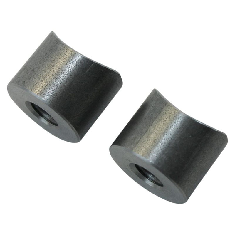 Two TC Bros. American-made black metal coped steel bungs 5/16-18 threaded 1/2 inch long on a white background.