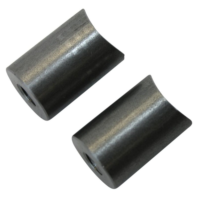 A pair of black Coped Steel Bungs 5/16-18 Threaded 1 inch Long by TC Bros on a white background.