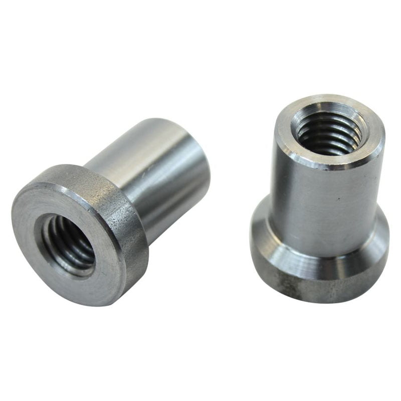 Two TC Bros stainless steel nuts on a white background, used for welding.