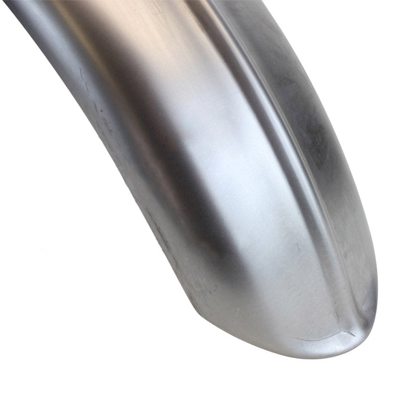 A close up of a silver Moto Iron® fender, constructed with stamped steel, on a white background.