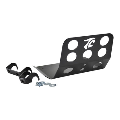 A TC Bros. Rack for Harley Davidson Dyna models with a number of holes on it for installation.