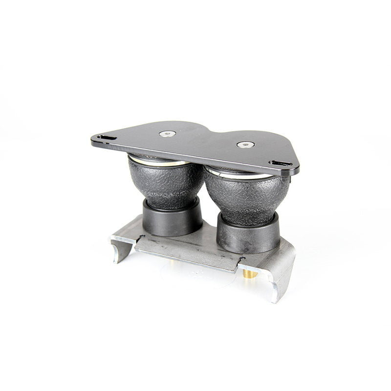 Product description: A pair of TC Bros. Dual Bag Air Ride Solo Seat Bracket Kit cylinders on a white background.