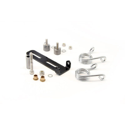 A set of metal parts and screws, including the TC Bros. Solo Seat Mounting Kit (with 3" Torsion Springs), on a white background.