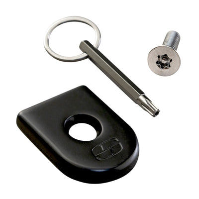A black Saddlemen key ring with a Saddlemen ATAB Security Seat Screw and a key, perfect for secure attachment to your Harley.