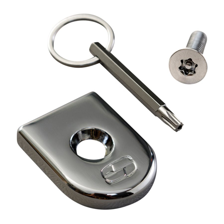A Saddlemen key ring with a key and a ATAB Security Seat Screw kit for added security.