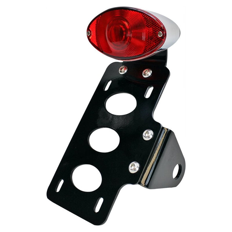 A TC Bros. Cat Eye Side Mount Tail Light/License Plate Bracket with a universal design and a red light.