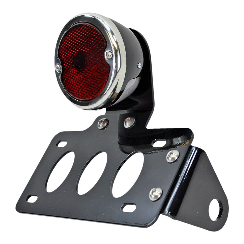 A TC Bros. black motorcycle tail light with a red light and TC Bros. Side Mount License Plate Bracket.