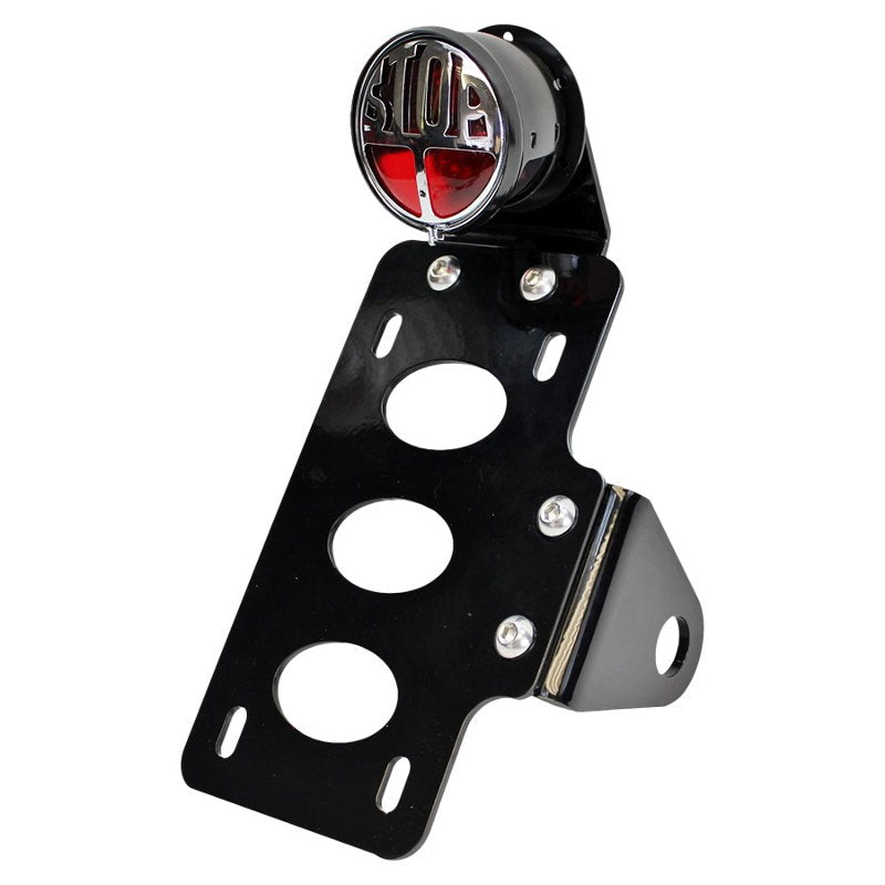 A versatile TC Bros. "Stop" Bobber Side Mount Tail Light/License Plate Bracket side-mounting a black motorcycle tail light on a white background.