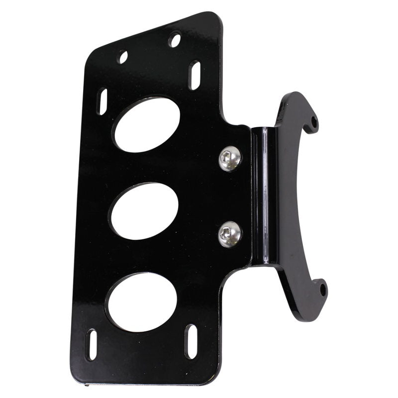 A TC Bros. metal plate with two holes on it that serves as a side mount license plate bracket (with no light) &