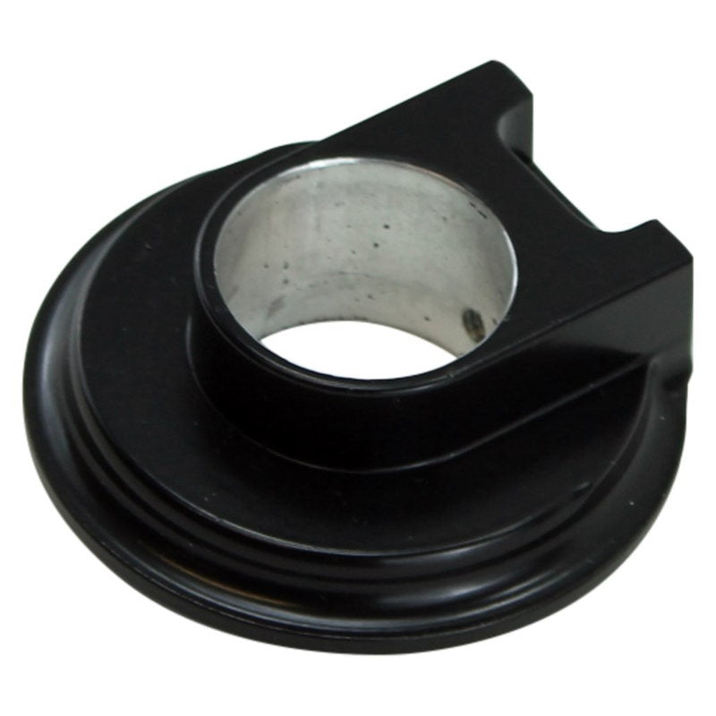 A LC Fabrications Harley Bar Switch Eliminator-Clutch (black) with a hole in it.