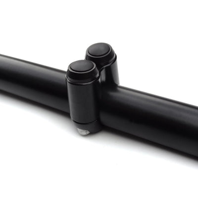 A Motone black tube with two Dual Button Microswitches for 1" handlebars on it.