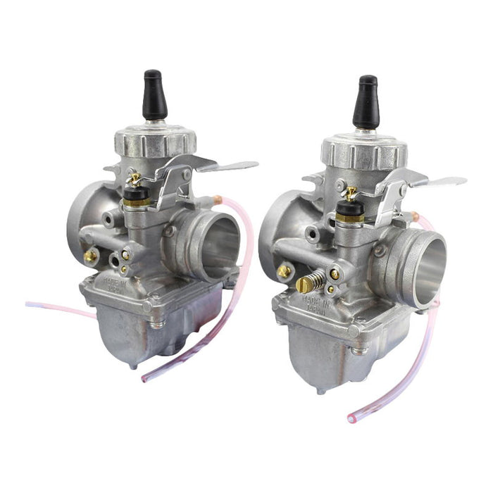 Two Mikuni 34MM VM round-slide performance carburetors for Yamaha XS650 are shown with a cable set and a Mikuni Carb Kit tuned by TC Bros. for Yamaha XS650 1976-1984 in front.