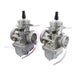 Two Mikuni 34MM VM round-slide performance carburetors for Yamaha XS650 are shown with a cable set and a Mikuni Carb Kit tuned by TC Bros. for Yamaha XS650 1976-1984 in front.